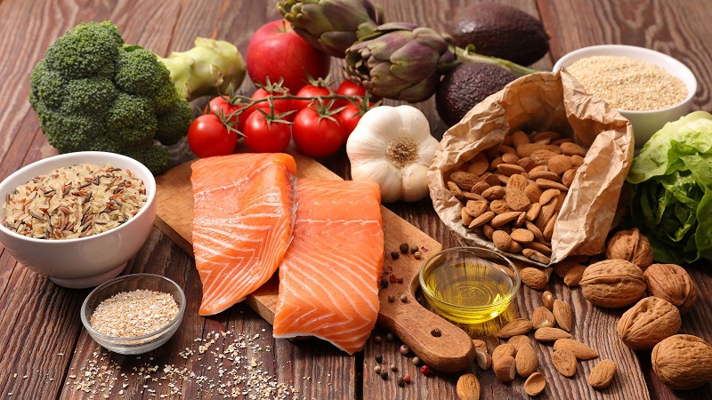 Healthy Foods such as nuts green leafy vegetables, grains and fish