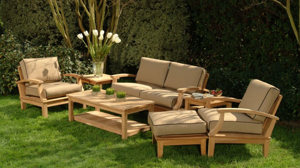 Getting Your Garden Guest-Ready / Inviting Love Seat Side Chairs and Tables in the grass in a back garden