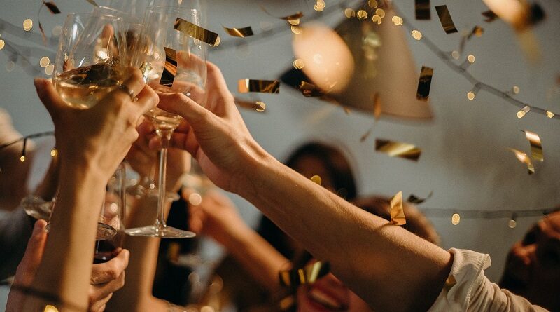 The Best Gifts for Your Party Lover Friend / People Raising Their Glasses at a Party