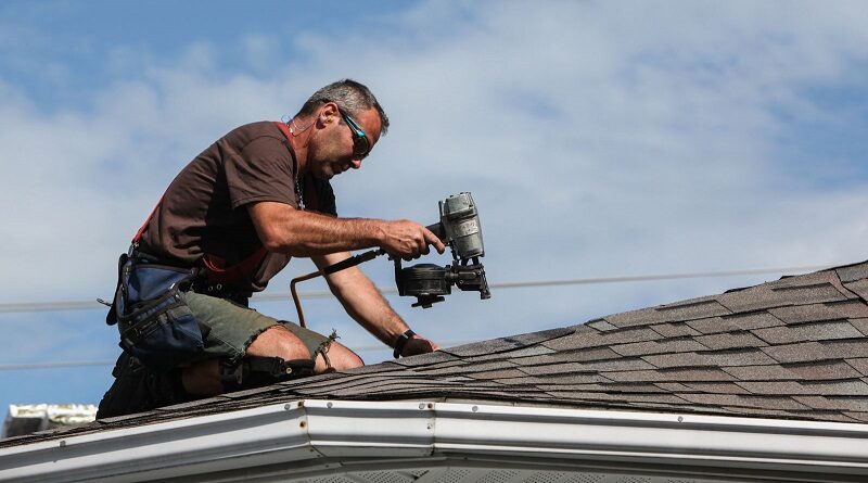 Roofer Installing Shingles