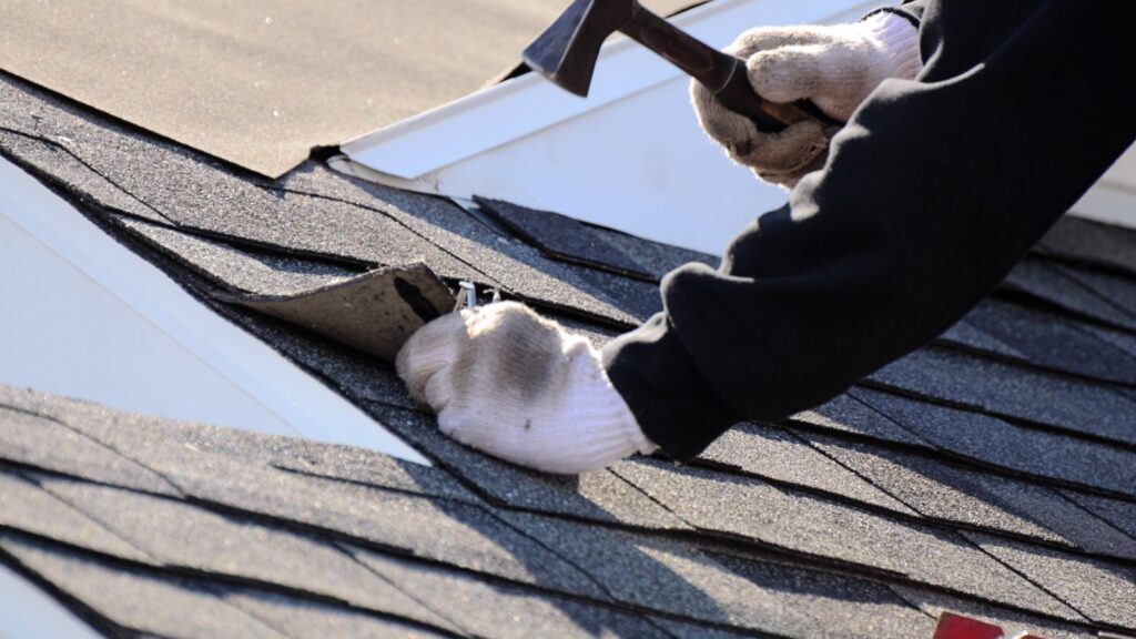 Signs You Need Roofing Services / Roofer at Work