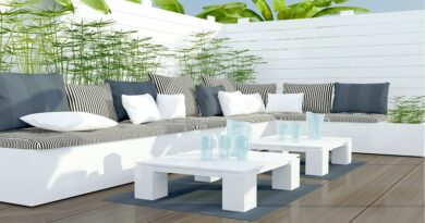 White Bench Seating with Black and White Striped Cushions with White Tables on Lovely Backyard Patio