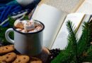 Books, cookies, mug of cocoa, and holiday greenery