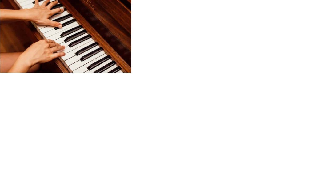 Person Playing the Piano