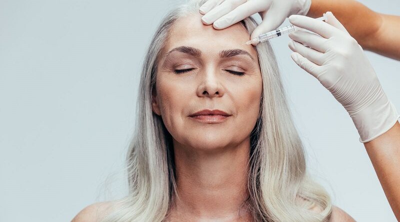 Woman receiving cosmetic injections