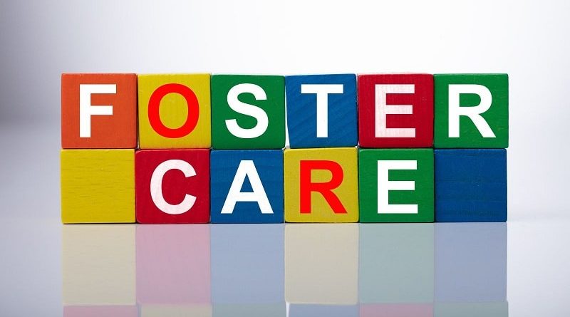 Navigating Your First Foster Child as a New Carer / Colorful Blocks Spelling Out the Words Foster Care