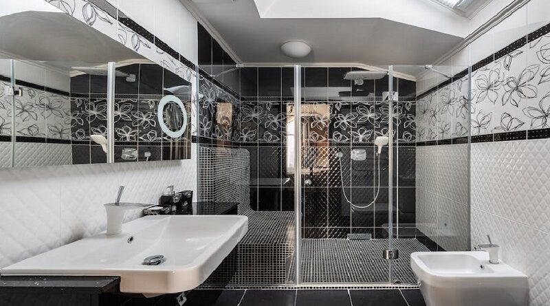 Eight Ways to Create a Personalized Oasis in Your Bathroom / Modern Black and White Bathroom