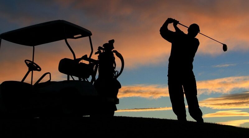 Man golfing as sunset / Golfing Paradise - Teeing Off in Vale do Lobo