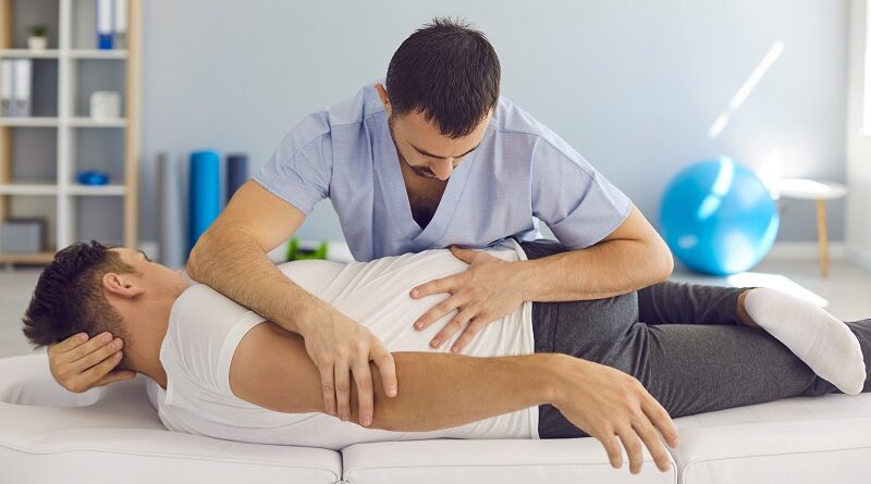 Man receiving a chiropractic adjustment / Improving Health and Wellness: The Role of Chiropractic Care in Pain Management