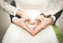 Bride and Groom with their Hands shaped Like Hearts / The Perfect Fall Wedding Guest Attire: What to Choose