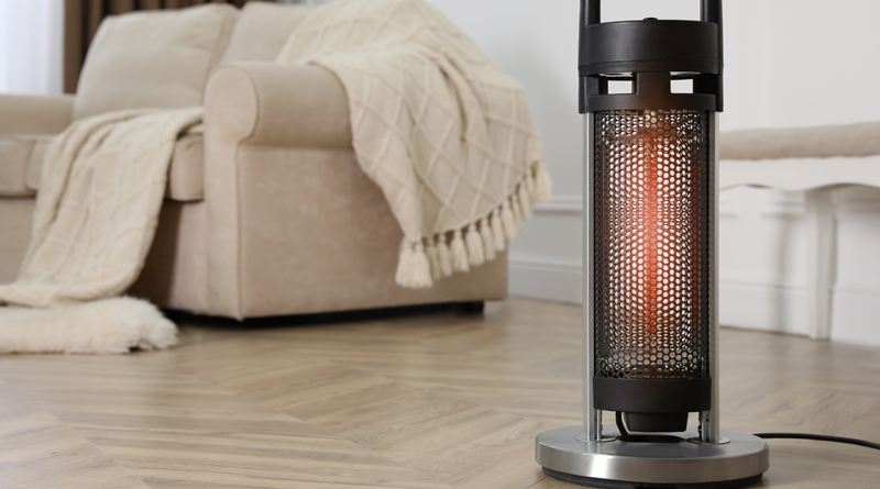 Space Heater in Room with Sofa and Throw Blanket / Surviving a Furnace Outage: 7 Essential Tips