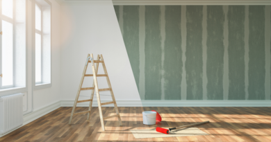 Ladder Paint and Paint Roller in a Room with White Walls and Wood Flooring / Tips for Keeping Your House Clean as You Renovate