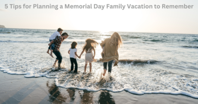 Family Wading in the Water at the Beach / 5 Tips for Planning a Memorial Day Family Vacation to Remember