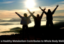 Three People on a Hill with Arms Raised to the Sky / How a Healthy Metabolism Contributes to Whole Body Wellness