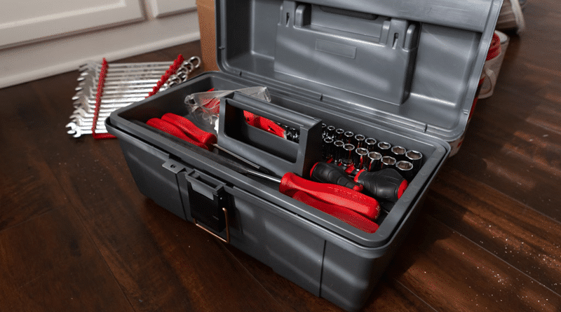 Open Toolbox on Table with Red Handled Tools and Set of Wrenches / When Does Your AC Need Repair