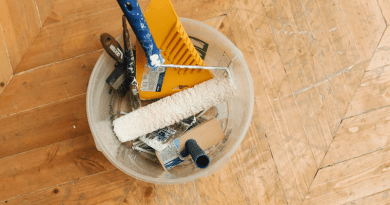 Bucket filled with painting supplies / The Ultimate Home Maintenance Checklist for First-Time Buyers