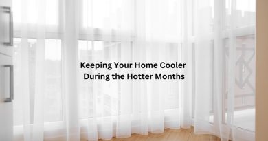 White Sheer Curtains on a Window in a Home / The Top Ways To Keep Your Home Cooler During The Hotter Months In Australia