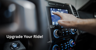 Hand on Car Panel Display / Top Reasons Drivers Choose Audio Installation to Upgrade Their Ride